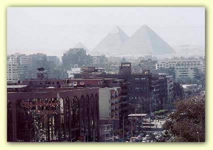 The Pyramids of Giza seen from the city